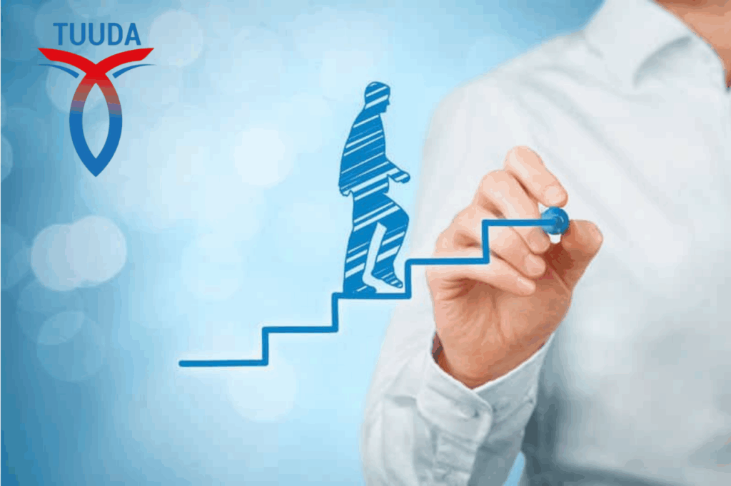 Visuel de TCTI : un personnage gravit un escalier tracé à la main
